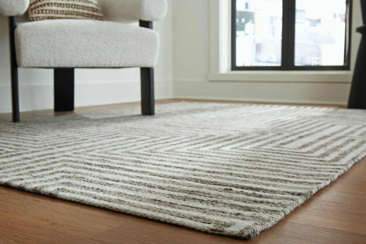 Jossen Ivory/Gray Medium Rug by Ashley at Eve Furniture