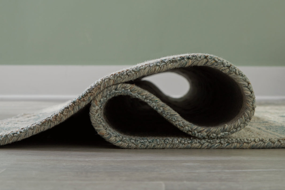 Jossland Turquoise/Ivory Medium Rug by Ashley at Eve Furniture