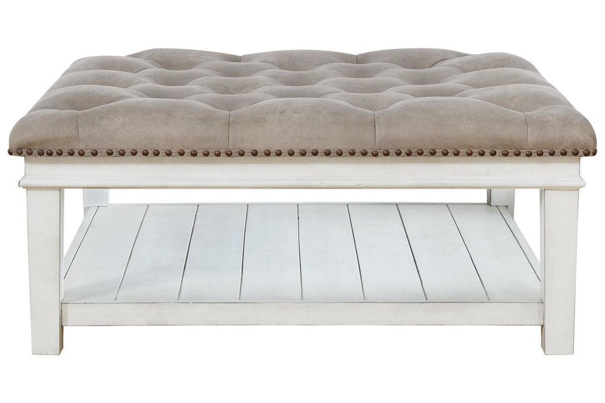 Kanwyn Whitewash Upholstered Ottoman Coffee Table by Ashley at Eve Furniture