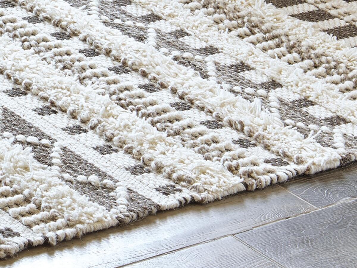 Karalee Ivory/Brown 5' x 7' Rug by Ashley at Eve Furniture