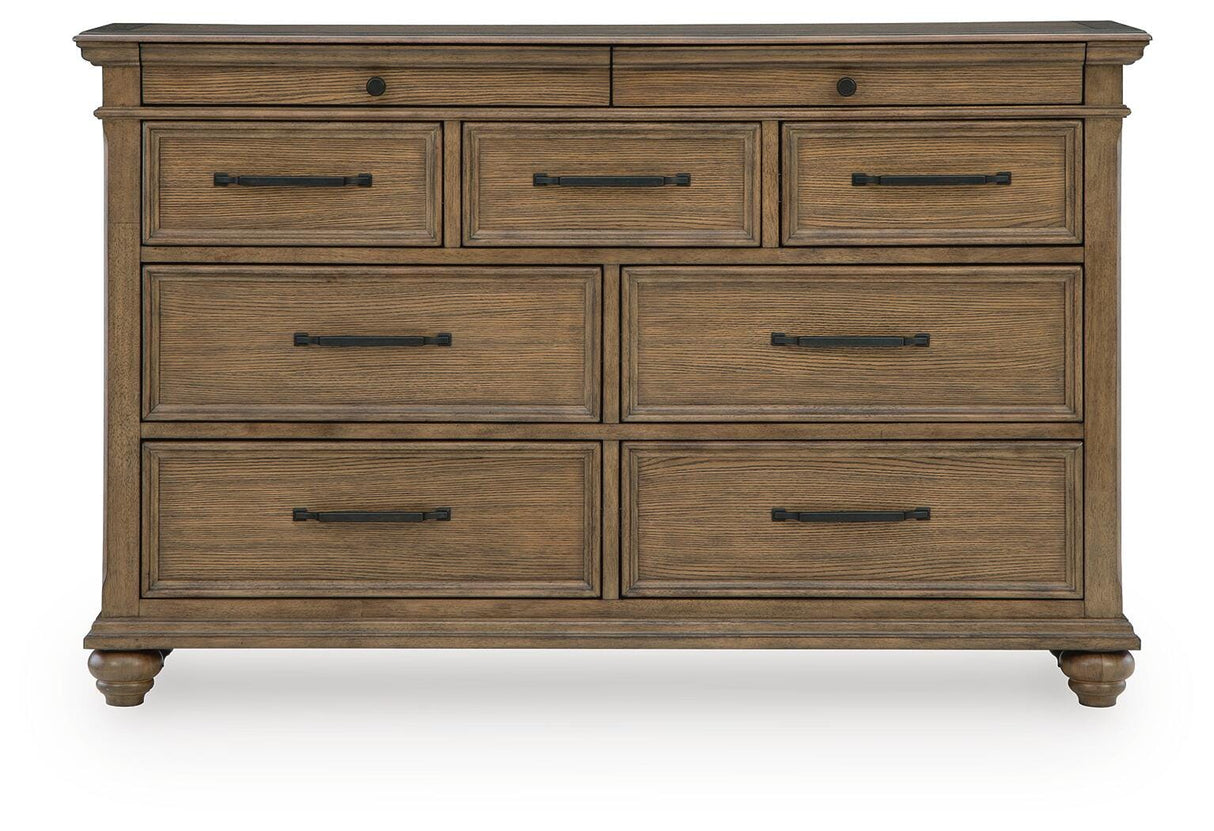Karallin Medium Brown Panel Bedroom Set by Ashley at Eve Furniture