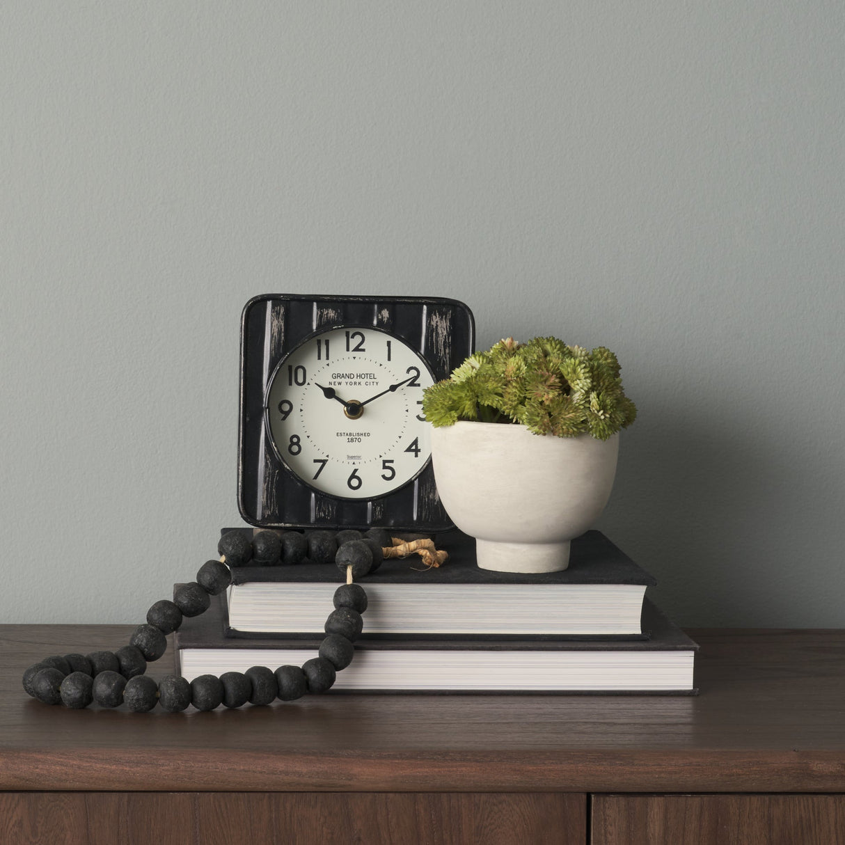 Karl Rustic Black Iron Rounded Square Table Clock by Mercana at Eve Furniture