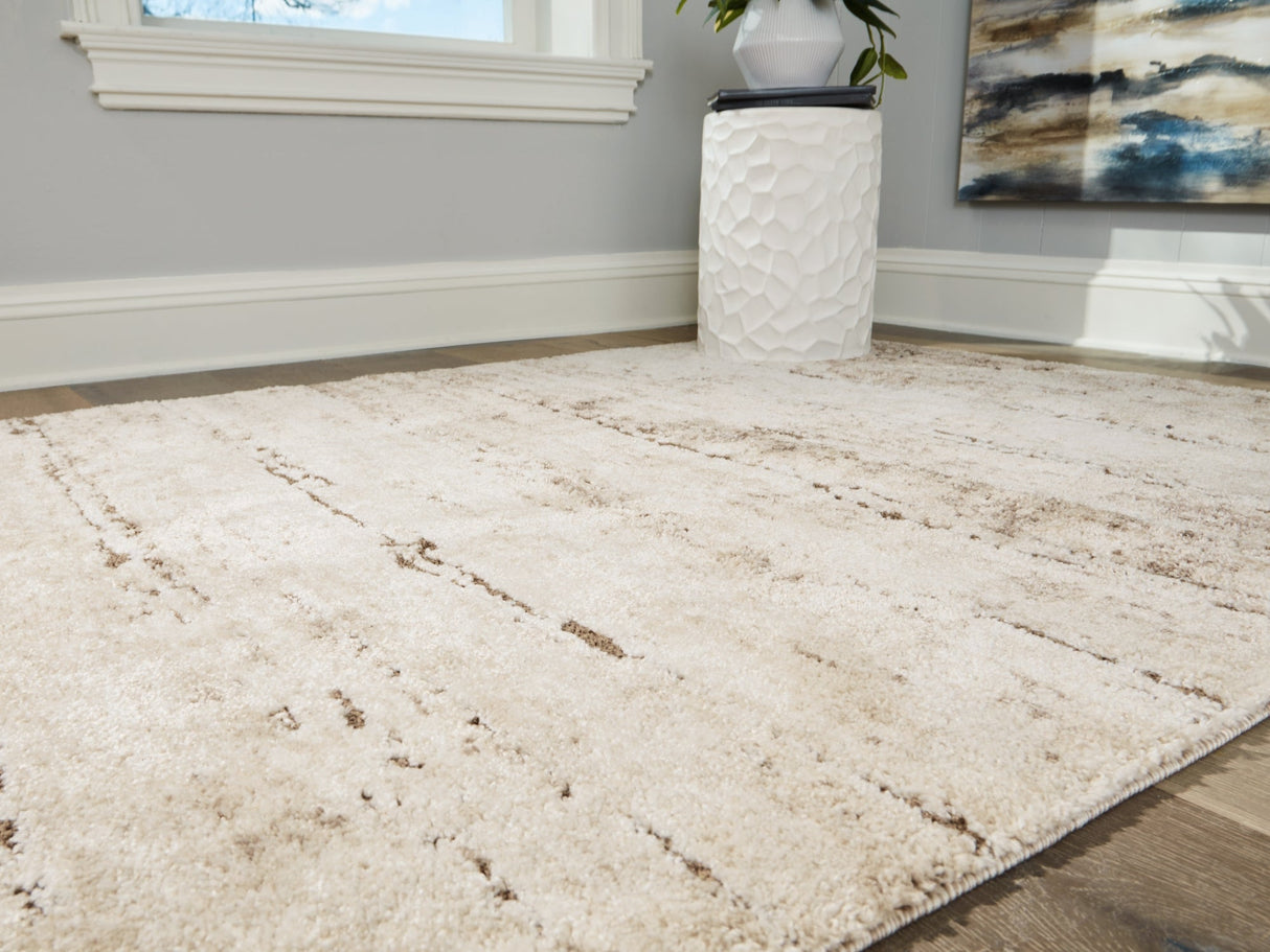 Kasney Cream/Brown Large Rug by Ashley at Eve Furniture
