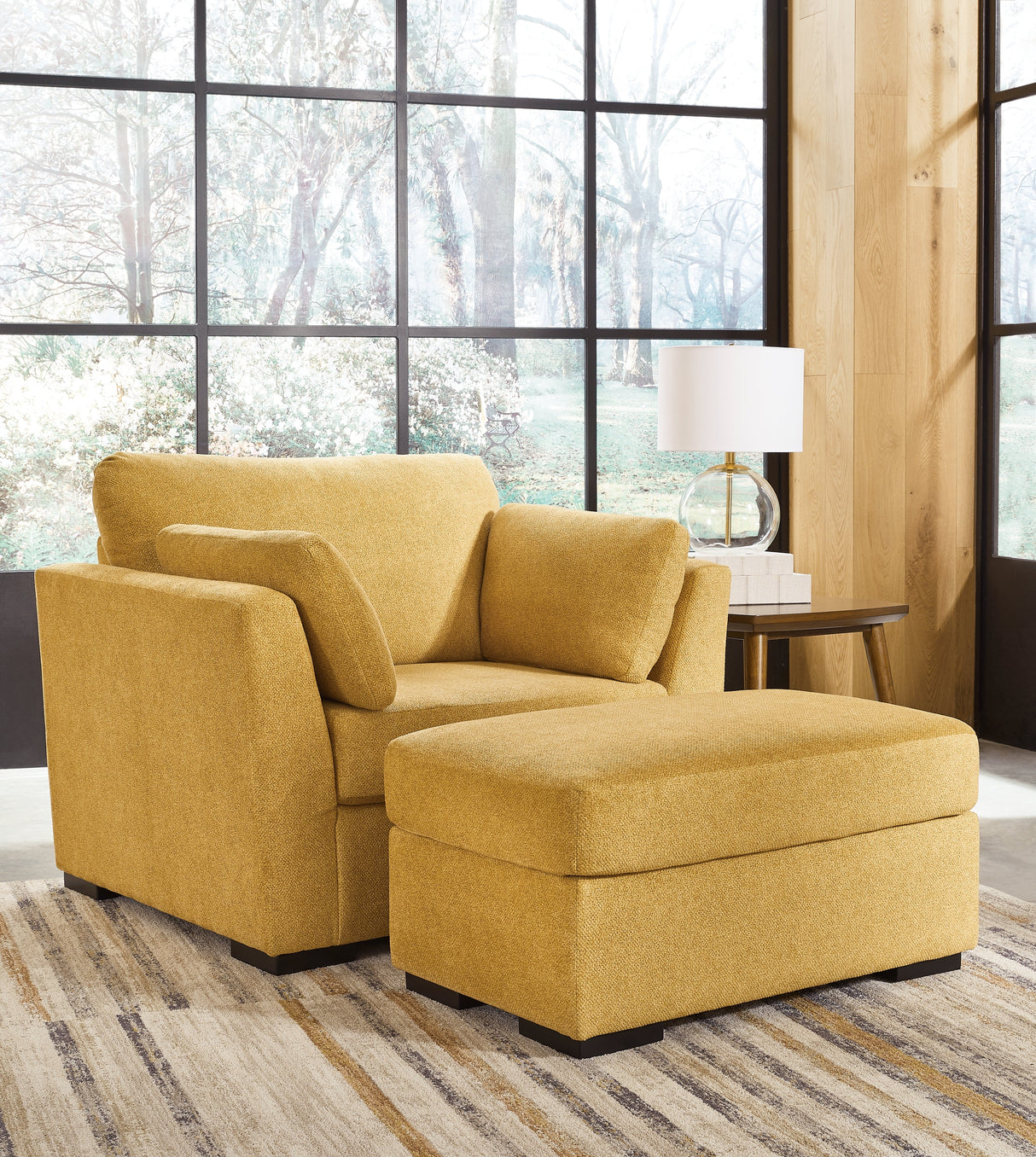 Keerwick Sunflower Chair and Ottoman by Ashley at Eve Furniture