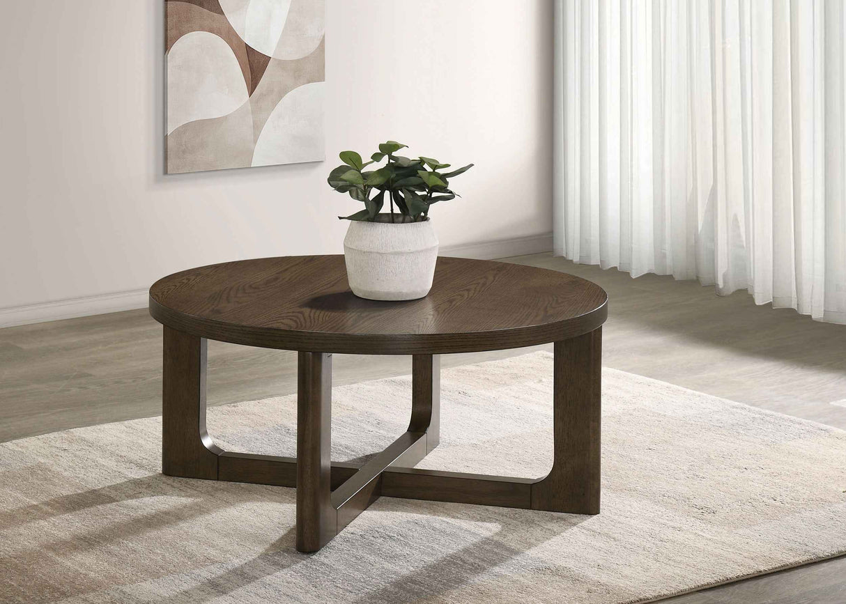 Kessler Brown Round Sculptural Wood Coffee Table by Coaster at Eve Furniture