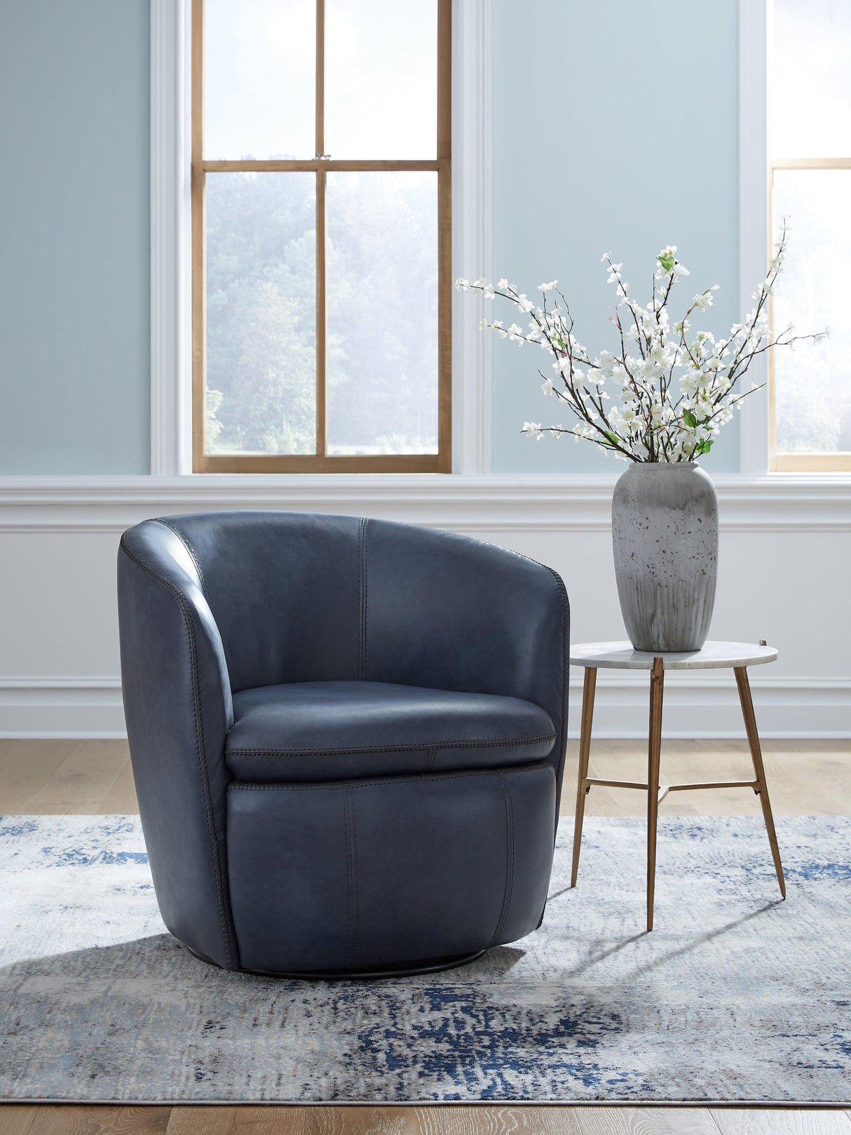 Kierreys Ocean Swivel Chair by Ashley at Eve Furniture