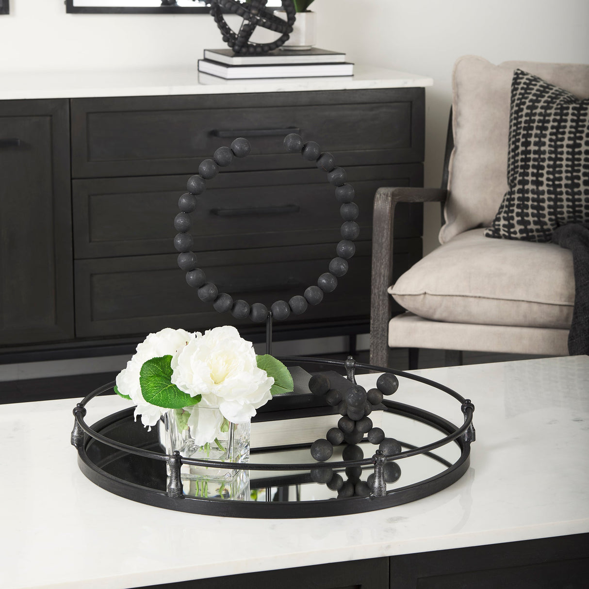 Kimbel 24L x 24W Black Metal Mirrored Base Round Tray by Mercana at Eve Furniture