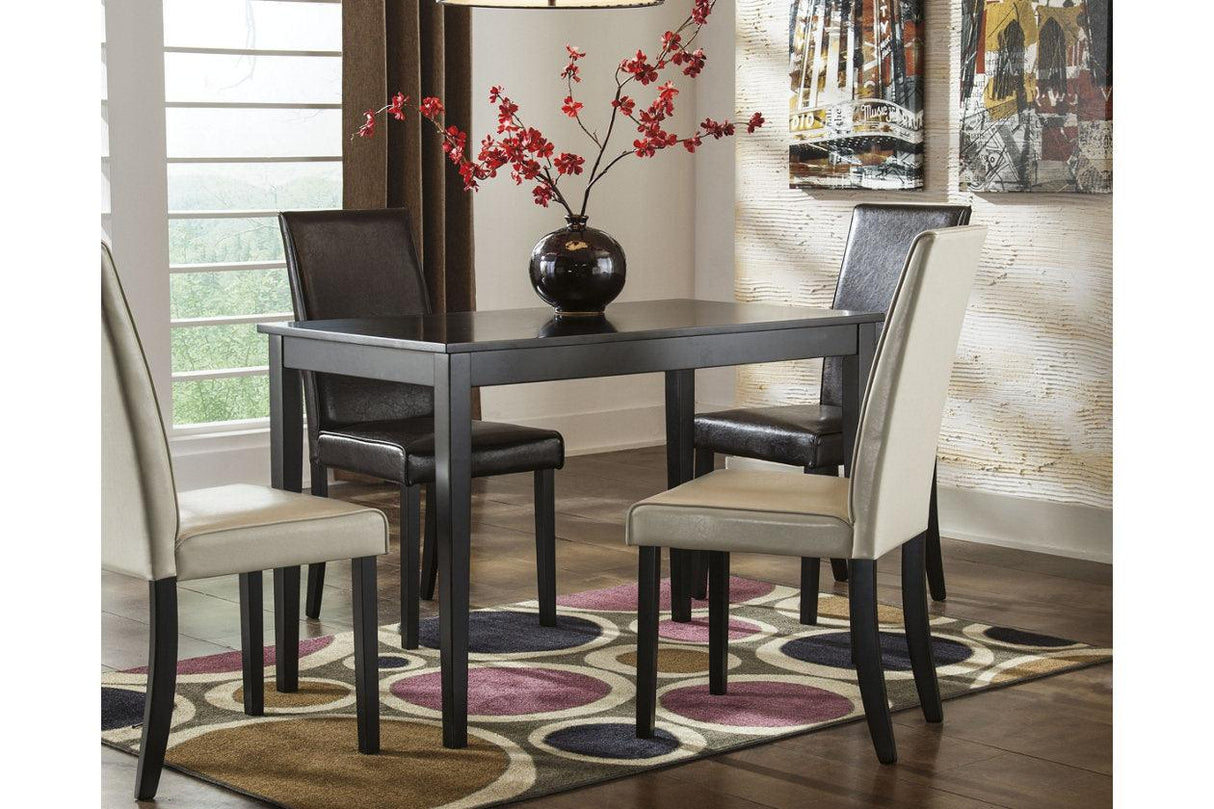 Kimonte Dark Brown Dining Table by Ashley at Eve Furniture