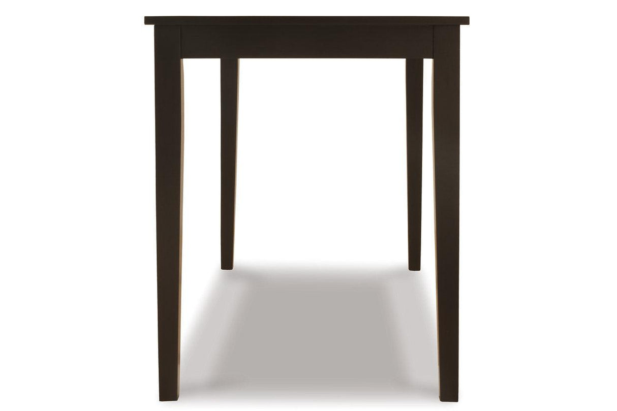 Kimonte Dark Brown Dining Table by Ashley at Eve Furniture