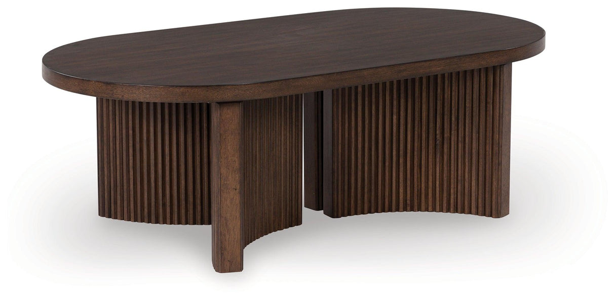 Korestone Dark Brown Coffee Table by Ashley at Eve Furniture
