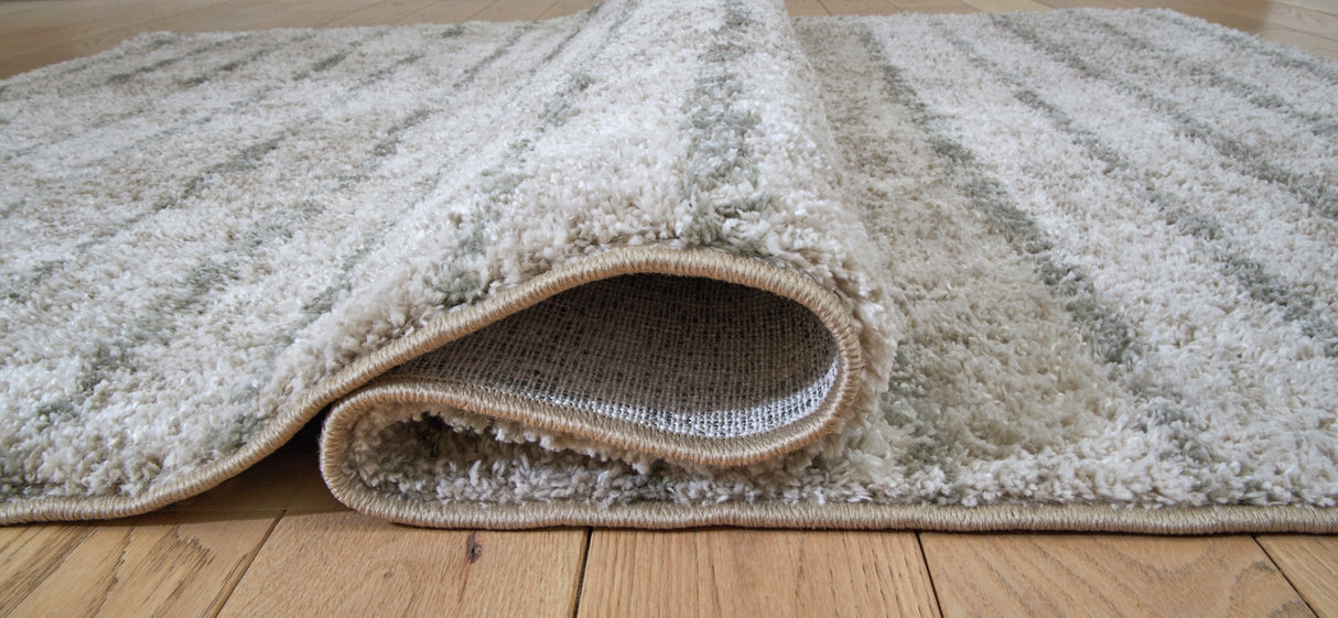 Laddway Cream/Green Medium Rug by Ashley at Eve Furniture