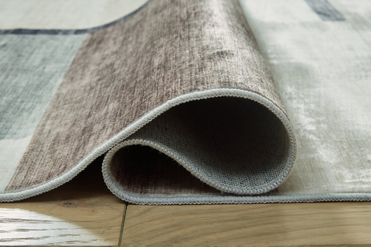 Larkport Cream/Brown/Gray Washable Large Rug by Ashley at Eve Furniture
