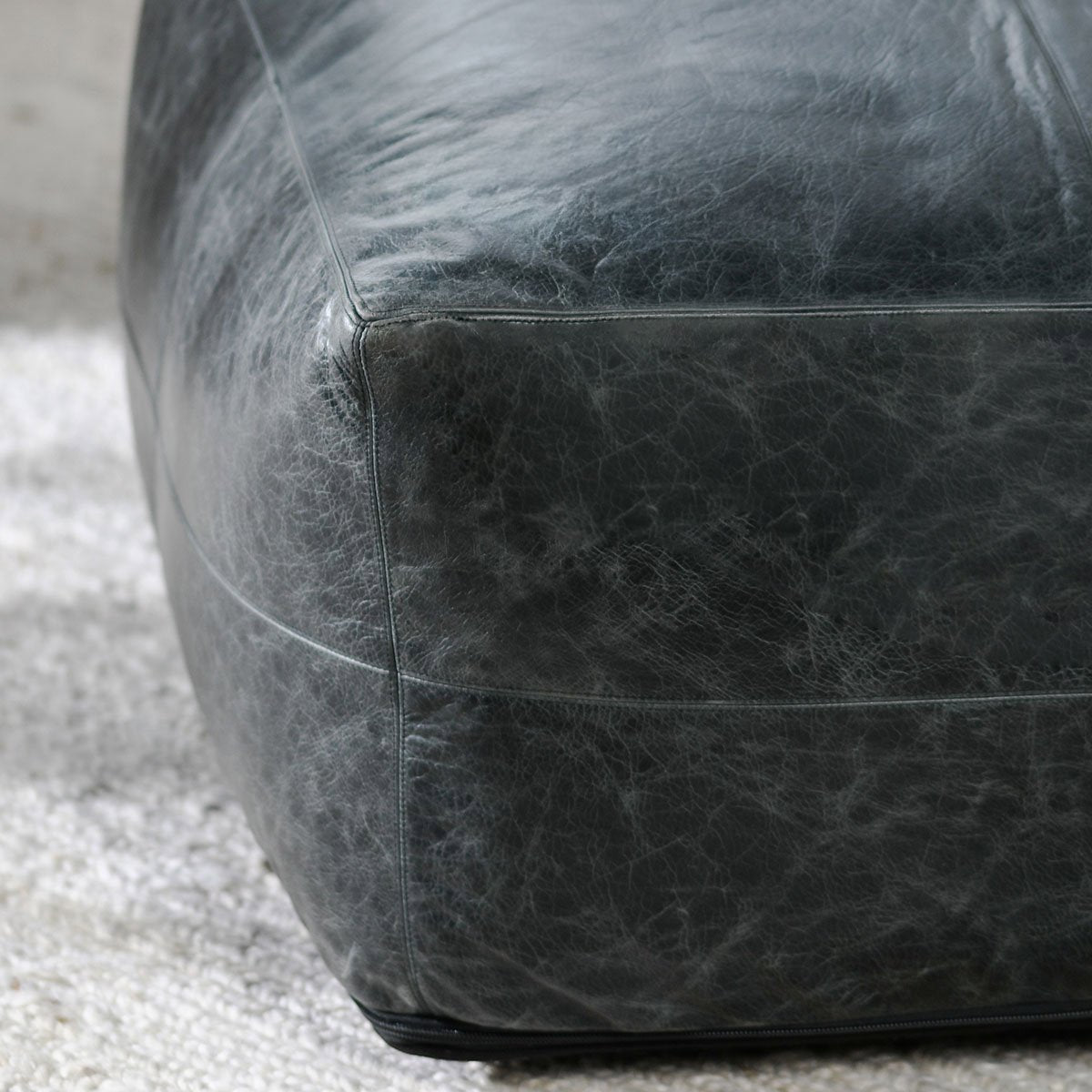Leather Onyx Pouf by Classic Home at Eve Furniture