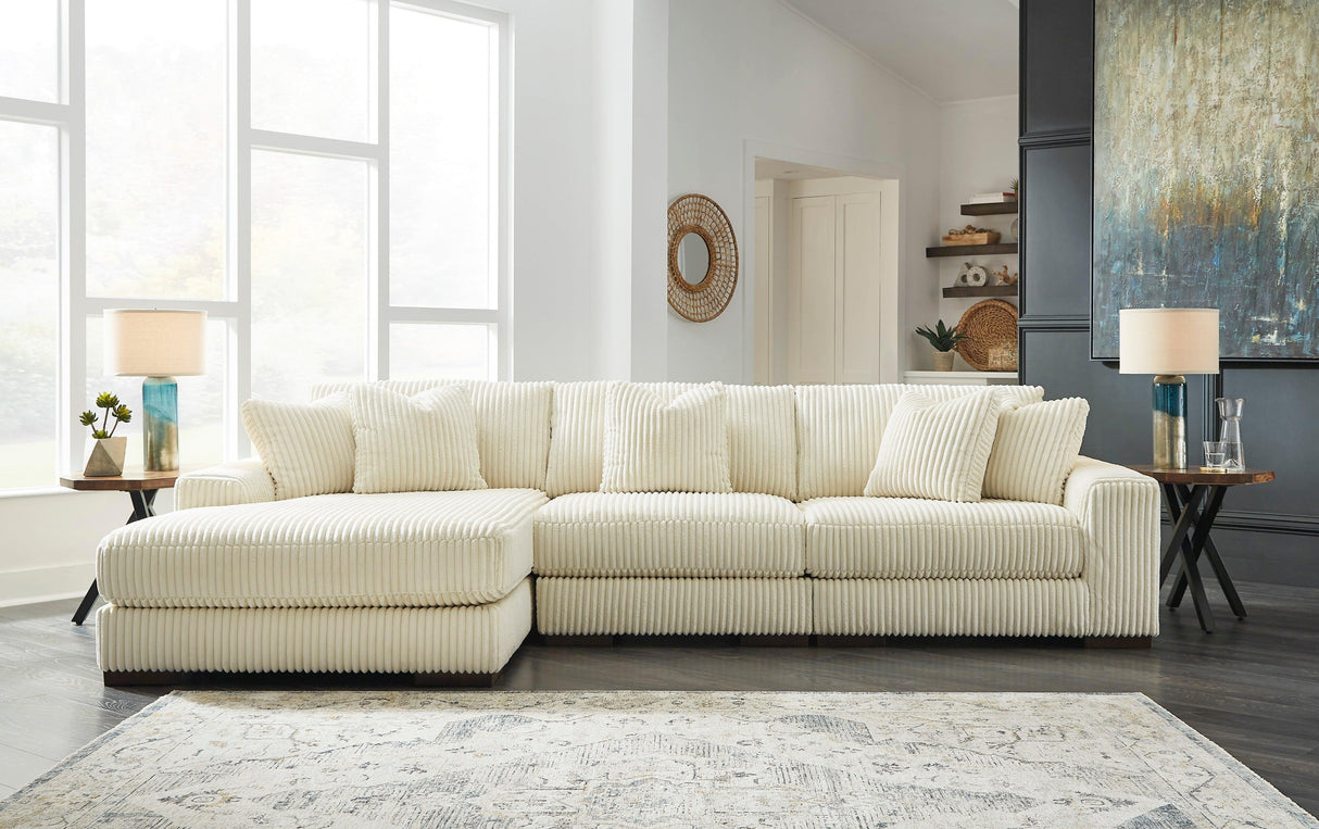 Lindyn Ivory 3-Piece Left Arm Facing Modular Chaise Sectional by Ashley at Eve Furniture