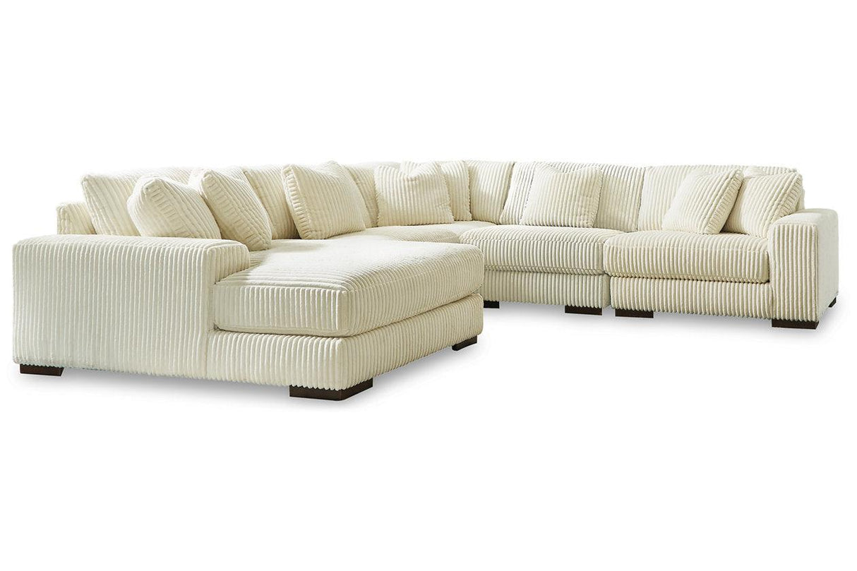 Lindyn Ivory 5-Piece Left Arm Facing Modular Chaise Sectional by Ashley at Eve Furniture