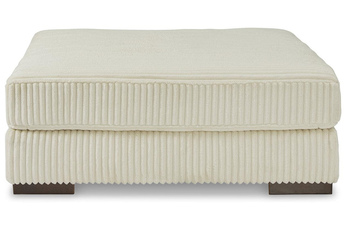 Lindyn Ivory Oversized Accent Ottoman by Ashley at Eve Furniture