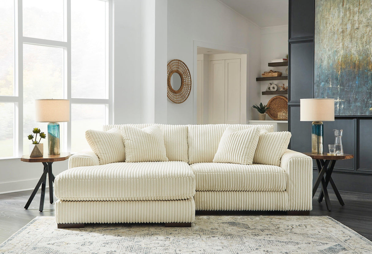 Lindyn Ivory 2-Piece Left Arm Facing Modular Chaise Sectional by Ashley at Eve Furniture