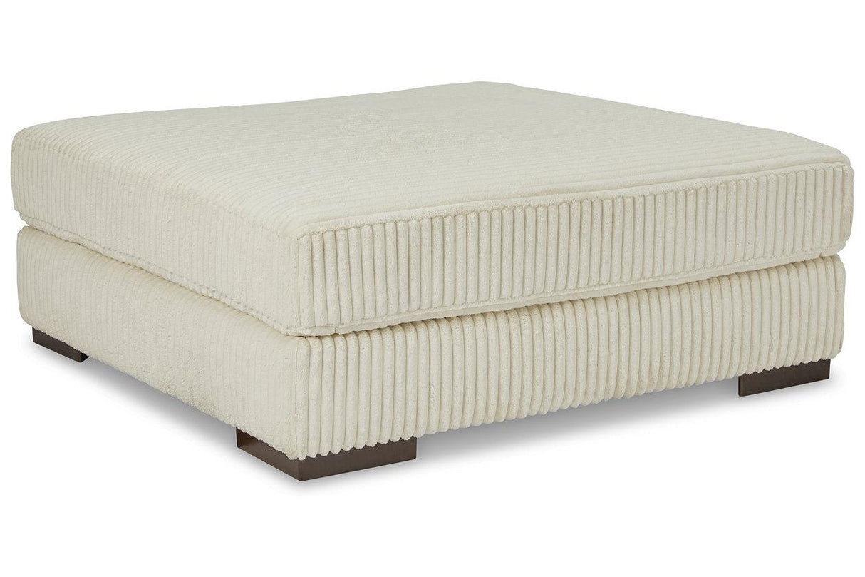 Lindyn Ivory Oversized Accent Ottoman by Ashley at Eve Furniture