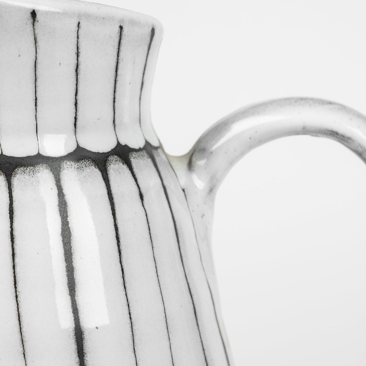 Lome Small White/Black Ceramic Jug by Mercana at Eve Furniture