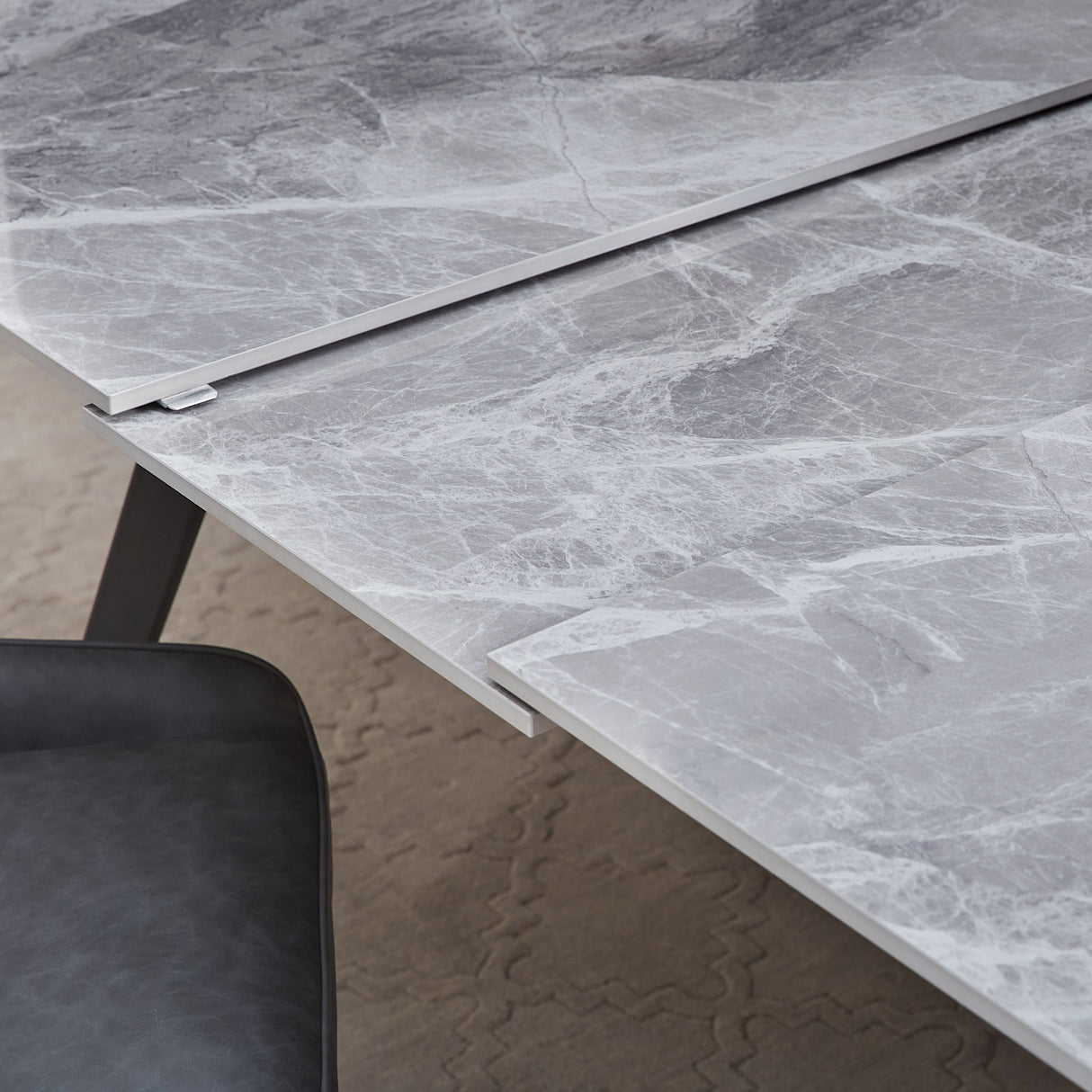 Lucia Extendable Stone Top Metal Leg Dining Table in Piedra and Black by Modus Furniture at Eve Furniture