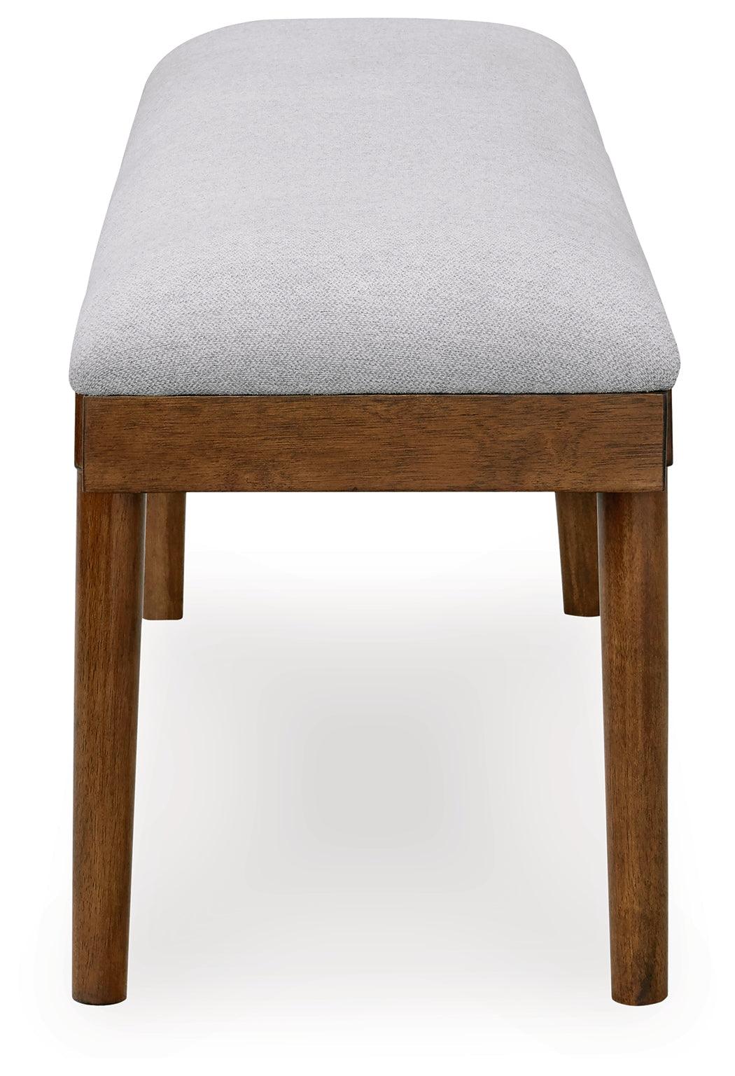 Lyncott Brown Dining Table and 4 Chairs and Bench by Ashley at Eve Furniture