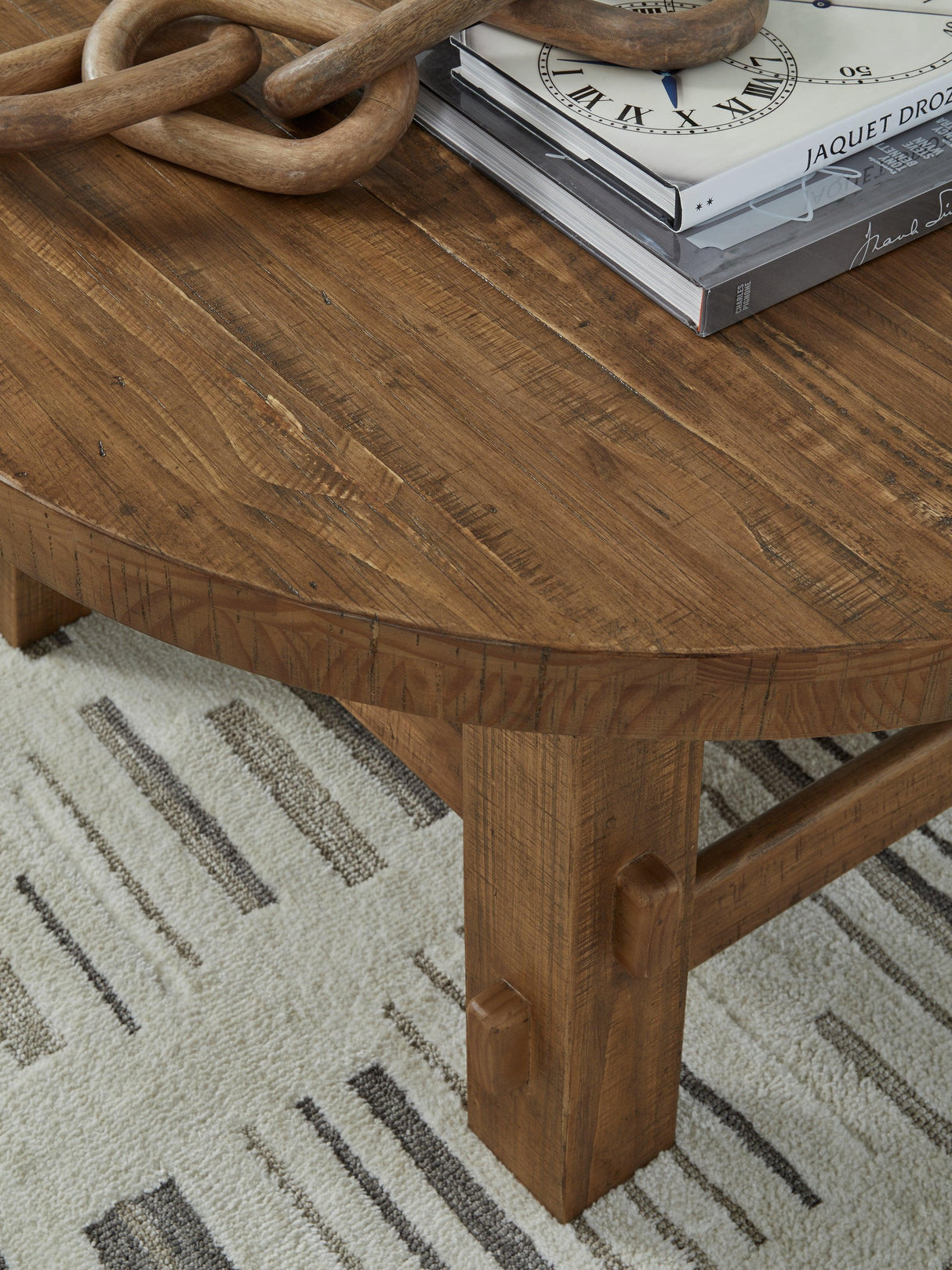 Mackifeld Warm Brown Coffee Table by Ashley at Eve Furniture