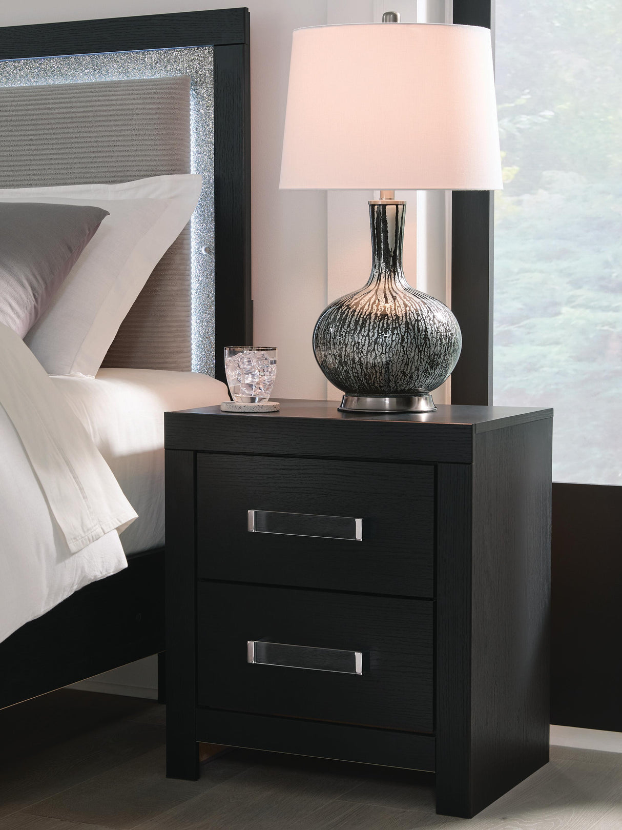 Maeling Black Nightstand by Ashley at Eve Furniture