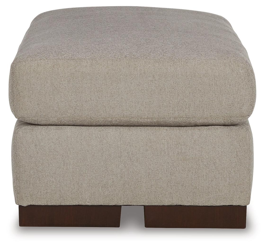 Maggie Flax Ottoman by Ashley at Eve Furniture