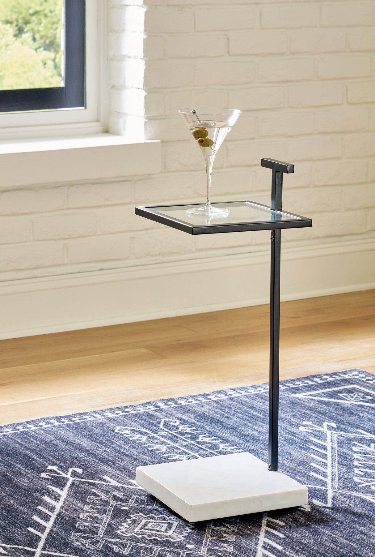 Mannill Black/White Accent Table by Ashley at Eve Furniture