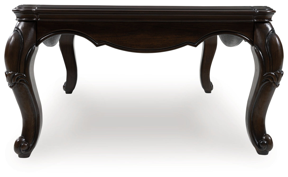 Maylee Dark Brown Coffee Table by Ashley at Eve Furniture