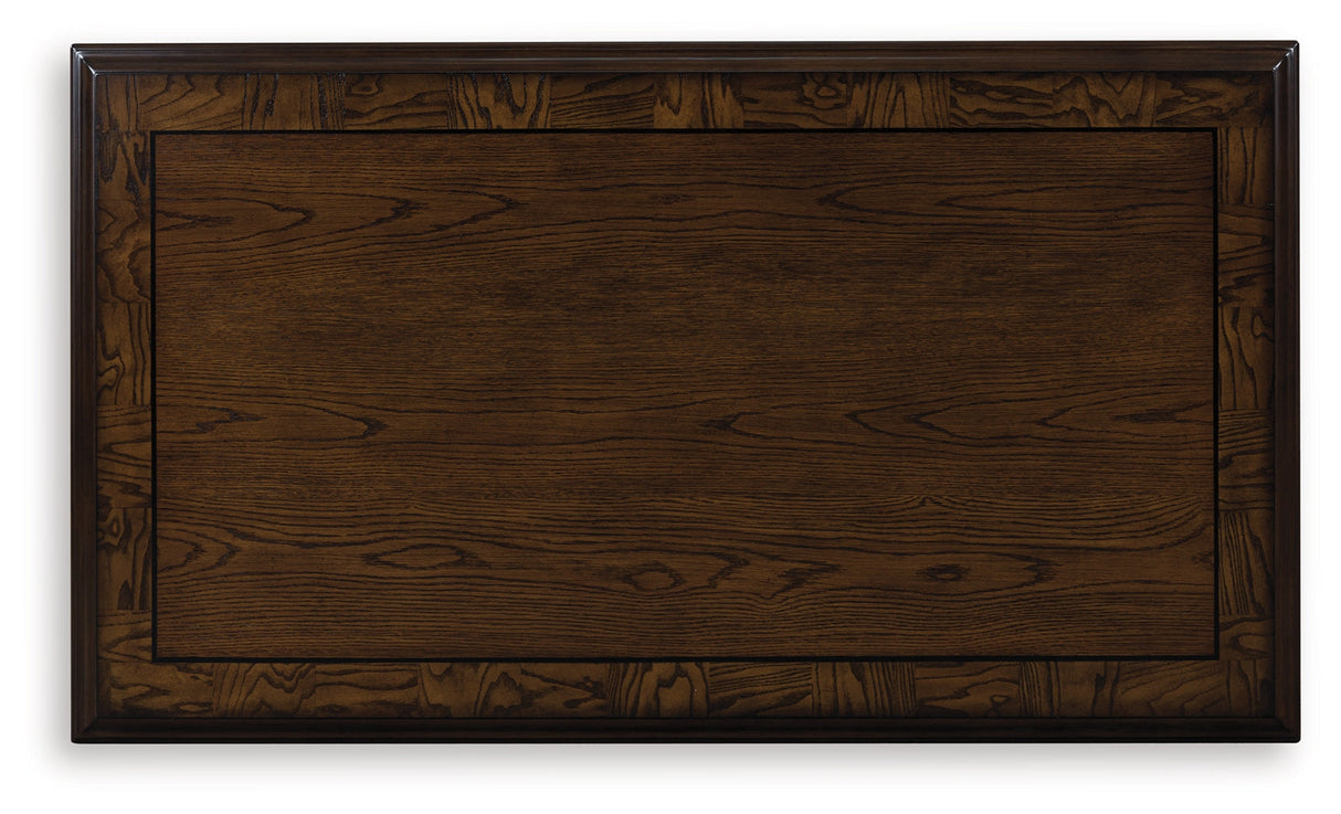 Maylee Dark Brown Coffee Table by Ashley at Eve Furniture