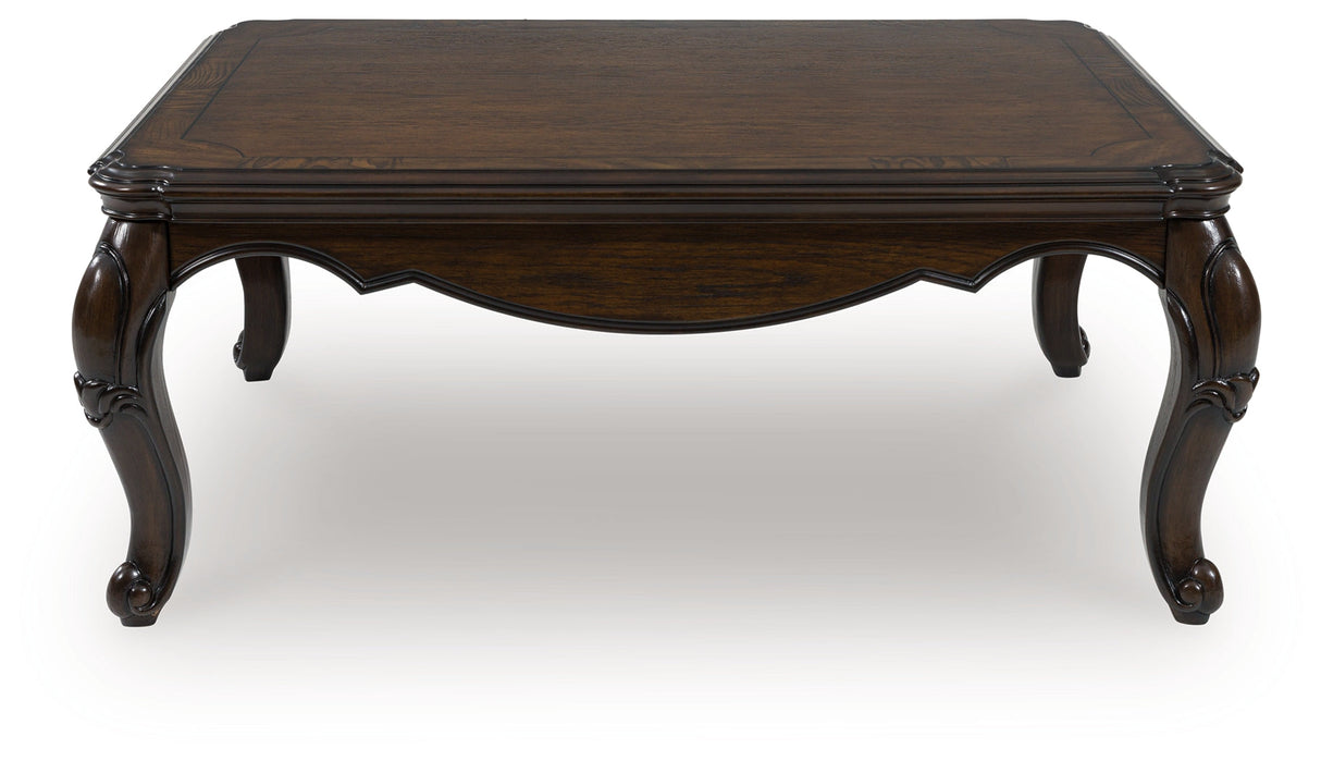 Maylee Dark Brown Coffee Table by Ashley at Eve Furniture