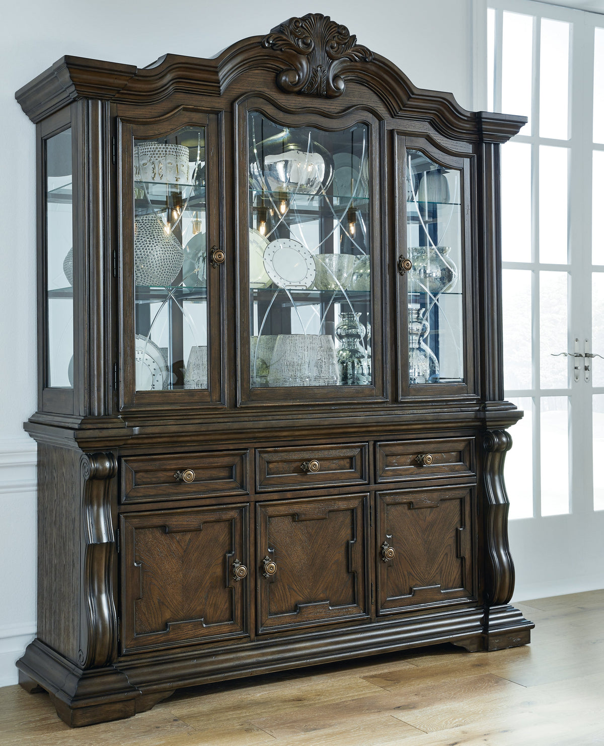 Maylee Dining Table and 10 Chairs with Storage in Dark Brown by Ashley at Eve Furniture