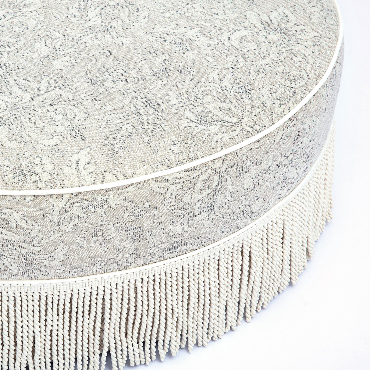 Tassy Tasseled Round Ottoman