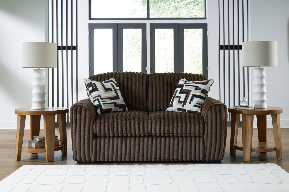 Midnight-Madness Chocolate Loveseat, Oversized Chaise and Ottoman by Ashley at Eve Furniture