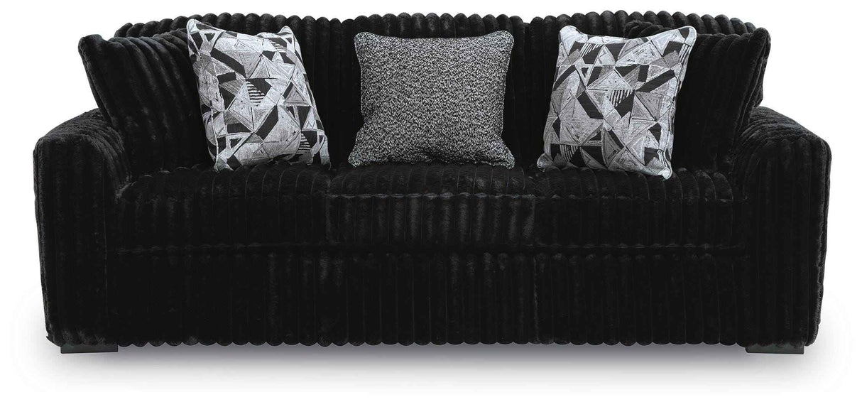 Midnight-Madness Onyx Sofa and Oversized Ottoman by Ashley at Eve Furniture