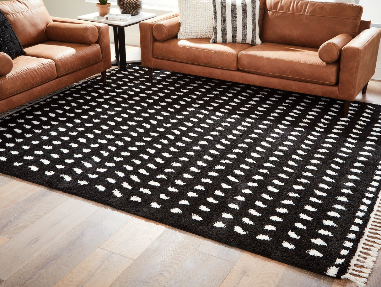 Minston Black/White 5' x 7' Rug by Ashley at Eve Furniture