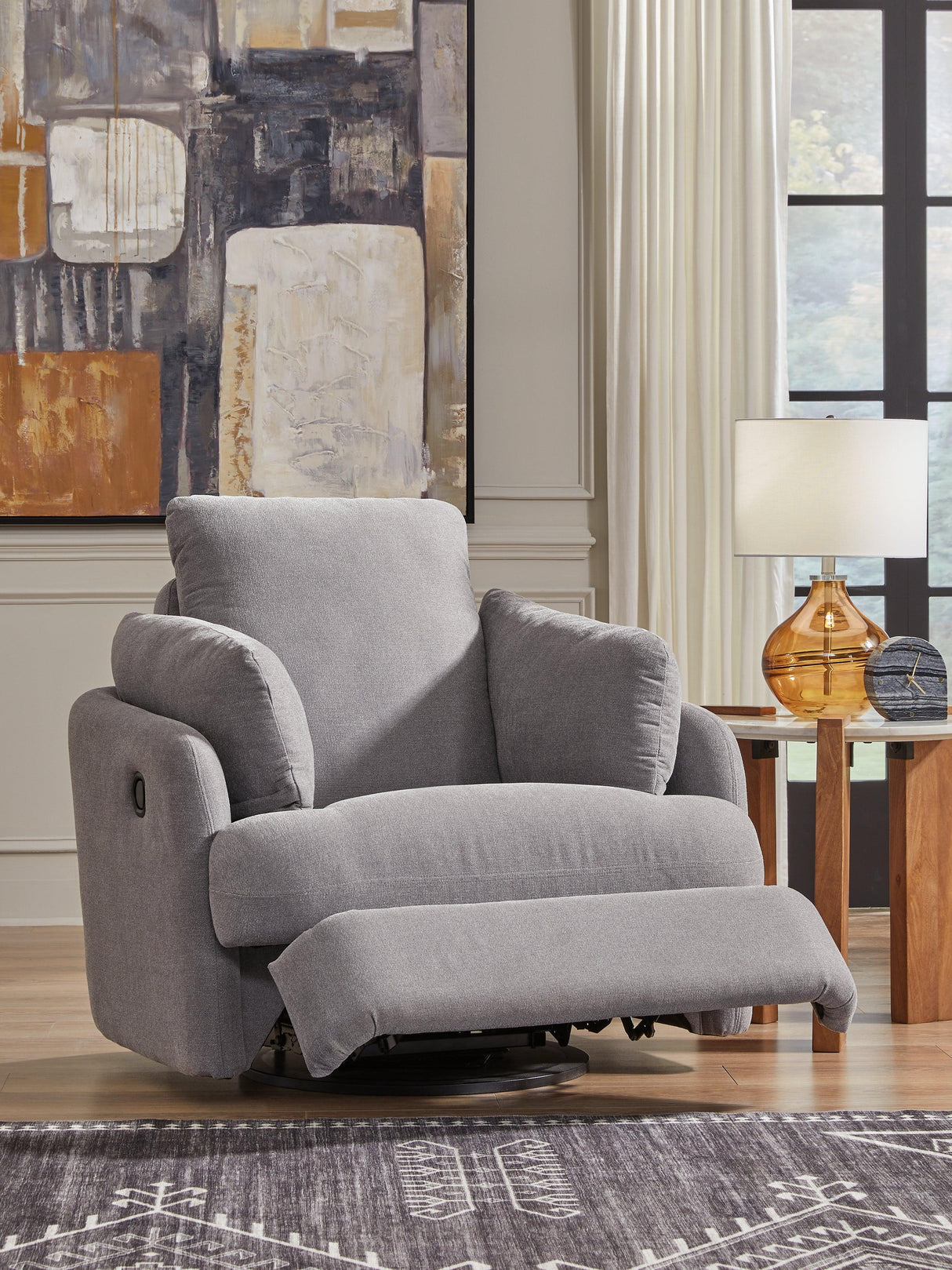 Modmax Granite Swivel Glider Chair by Ashley at Eve Furniture