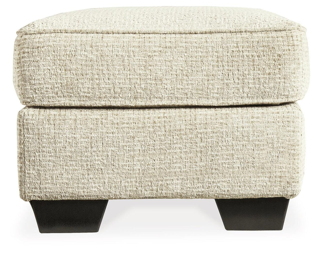 Monaghan Sandstone Ottoman by Ashley at Eve Furniture