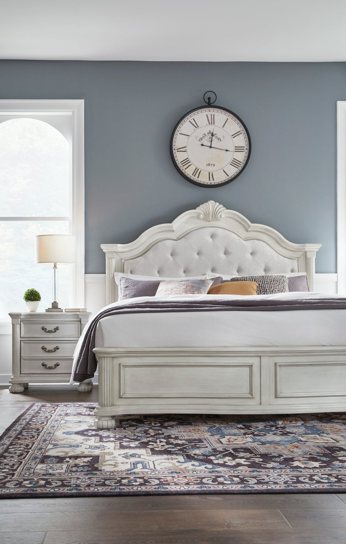 Montelaine Antique White Queen Upholstered Panel Bed by Ashley at Eve Furniture
