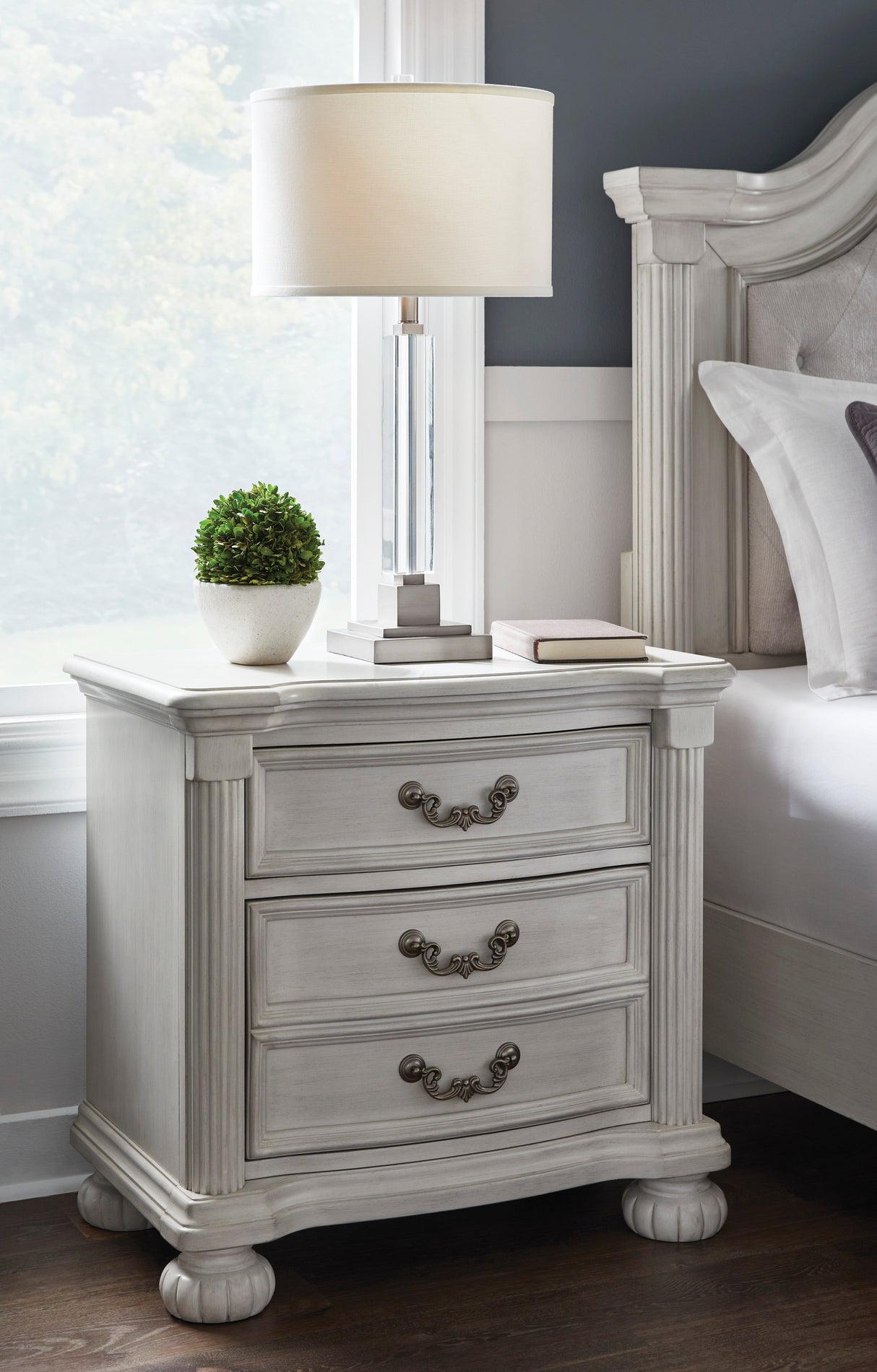 Montelaine Antique White Upholstered Panel Bedroom Set by Ashley at Eve Furniture