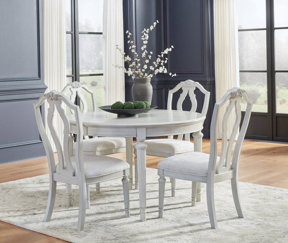 Montelaine Antiqued White Extendable Dining Room Set by Ashley at Eve Furniture