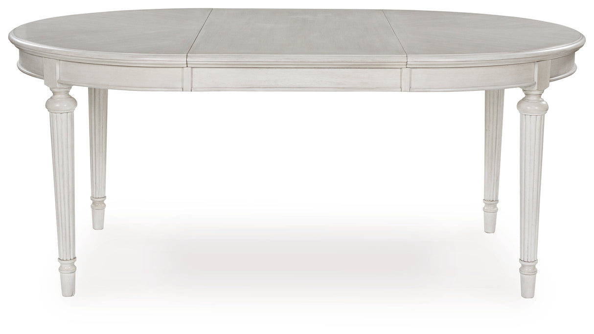 Montelaine Antiqued White Extendable Dining Room Set by Ashley at Eve Furniture