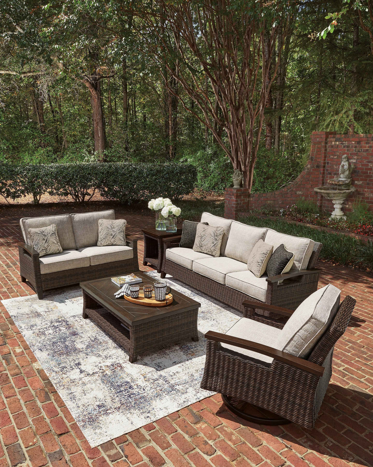 Monterey Point Dark Brown Outdoor Sofa and Loveseat by Ashley at Eve Furniture