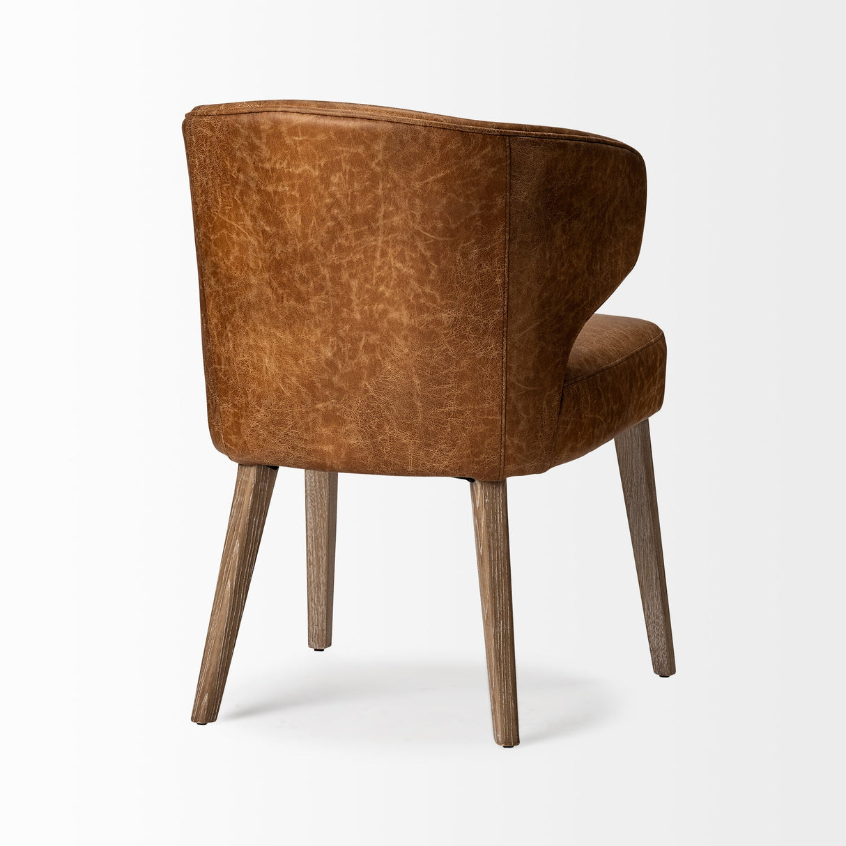 Niles 22.5L x 24.0W x 32.0H Brown Faux Leather Seat W/Brown Wooden Legs Wingback Dining Chair by Mercana at Eve Furniture