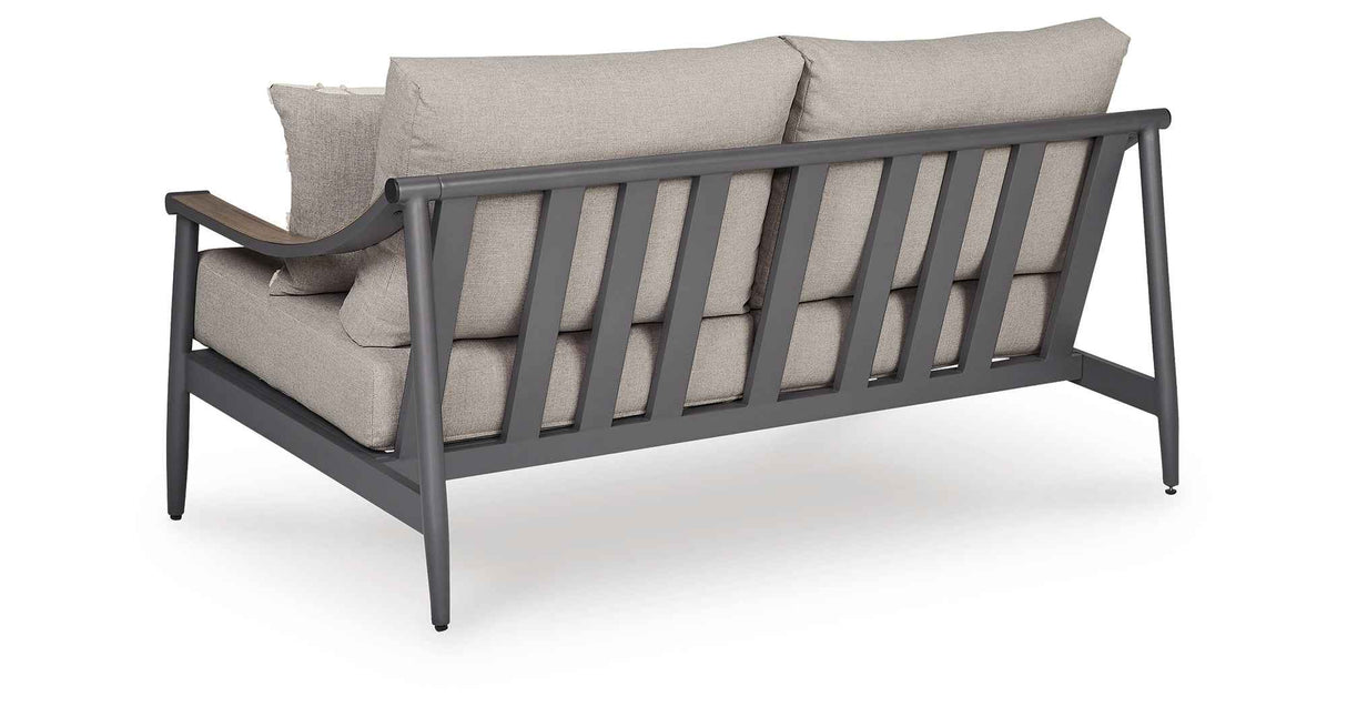 Ocean Beach Gray Outdoor Loveseat with Cushion by Ashley at Eve Furniture