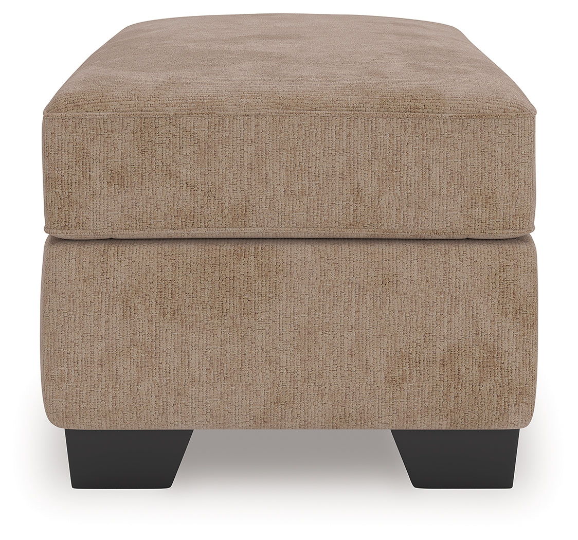 Olten Mocha Ottoman by Ashley at Eve Furniture