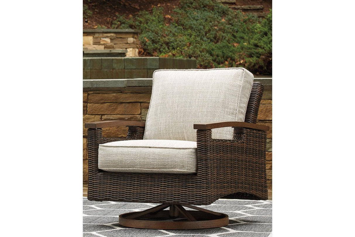 Paradise Trail Medium Brown Swivel Lounge Chair (Set of 2) by Ashley at Eve Furniture