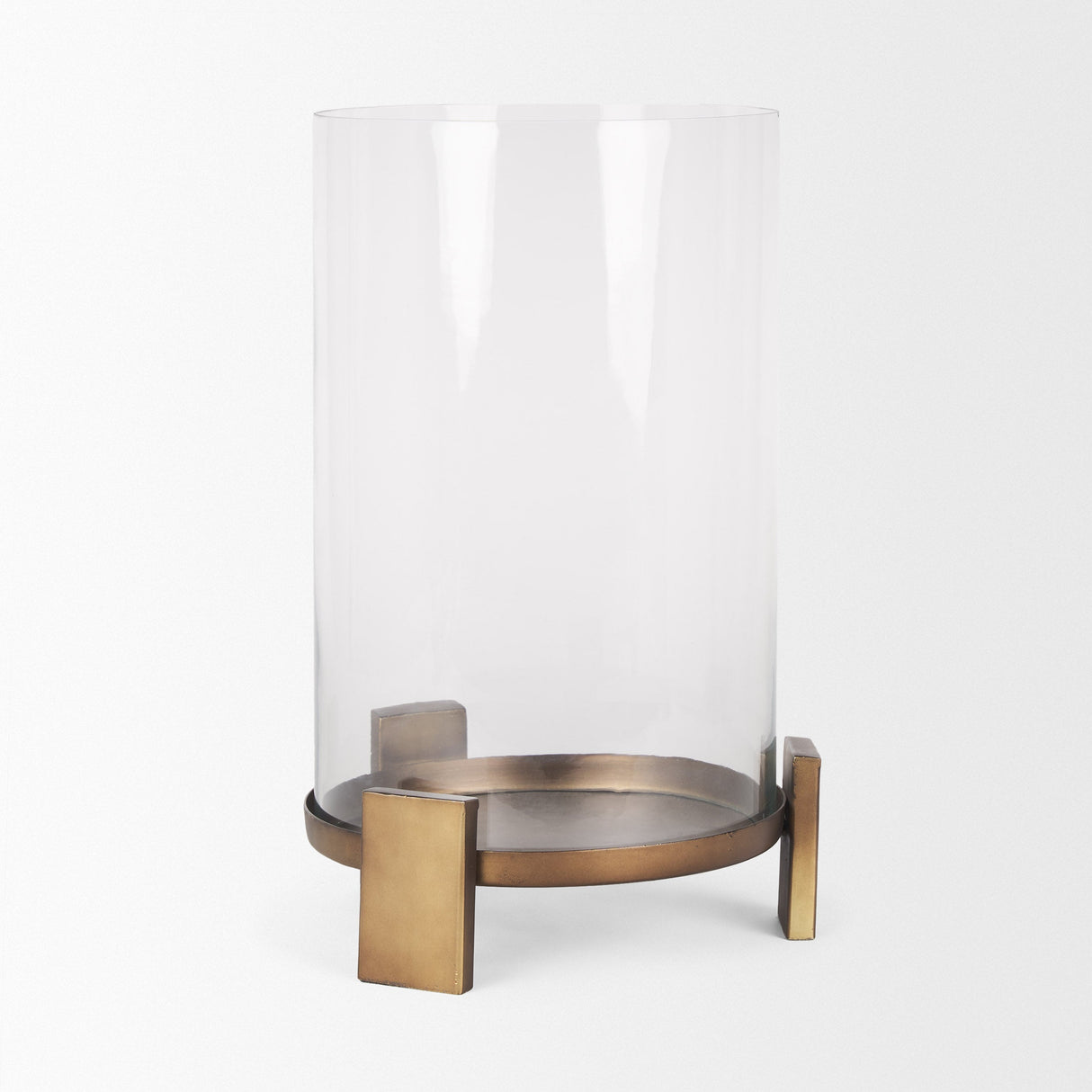 Price Large Antiqued Gold Metal w/ Glass Hurricane Candle Holder by Mercana at Eve Furniture