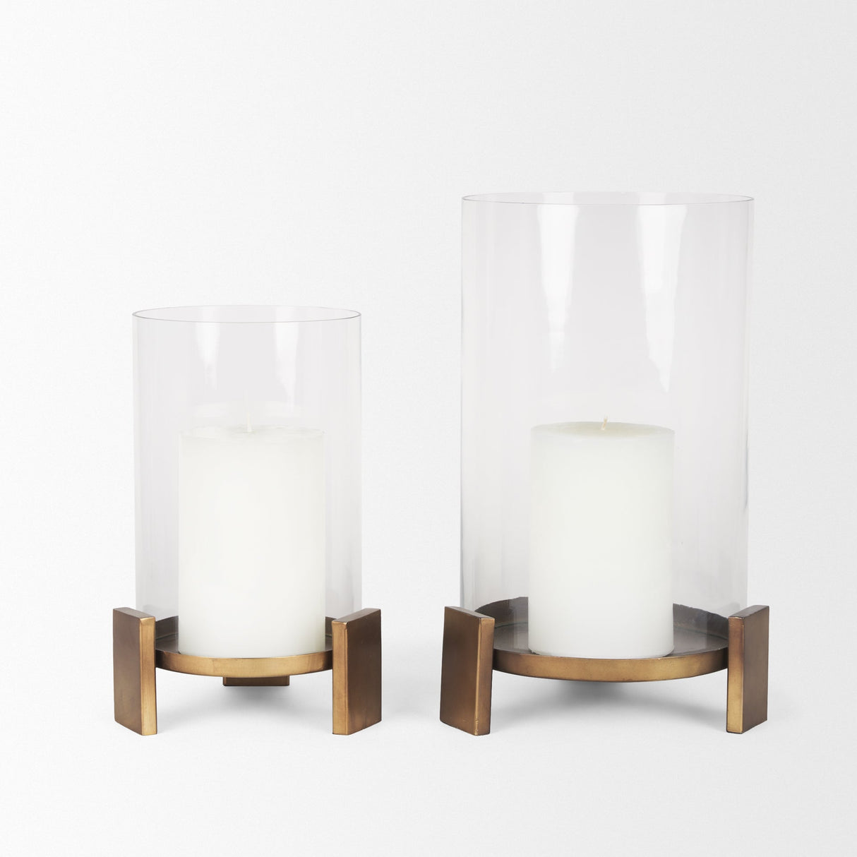 Price Small Antiqued Gold Metal w/ Glass Hurricane Candle Holder by Mercana at Eve Furniture